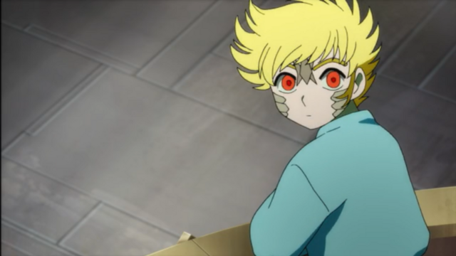 screenshot of a little blonde boy with lizard like scales on his face